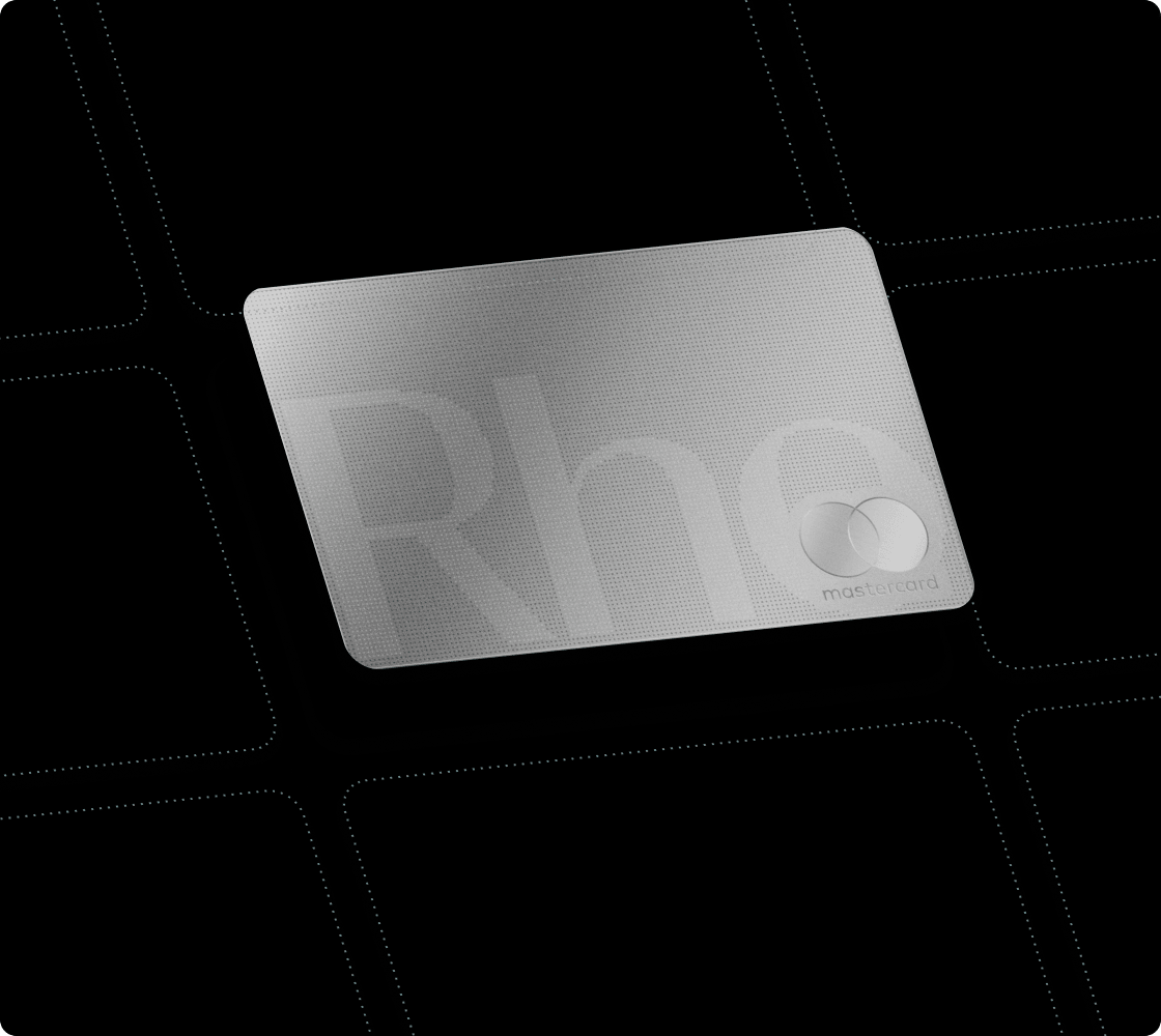 Silver credit card with "Rho" and Mastercard logo, set against a black background with dotted squares.