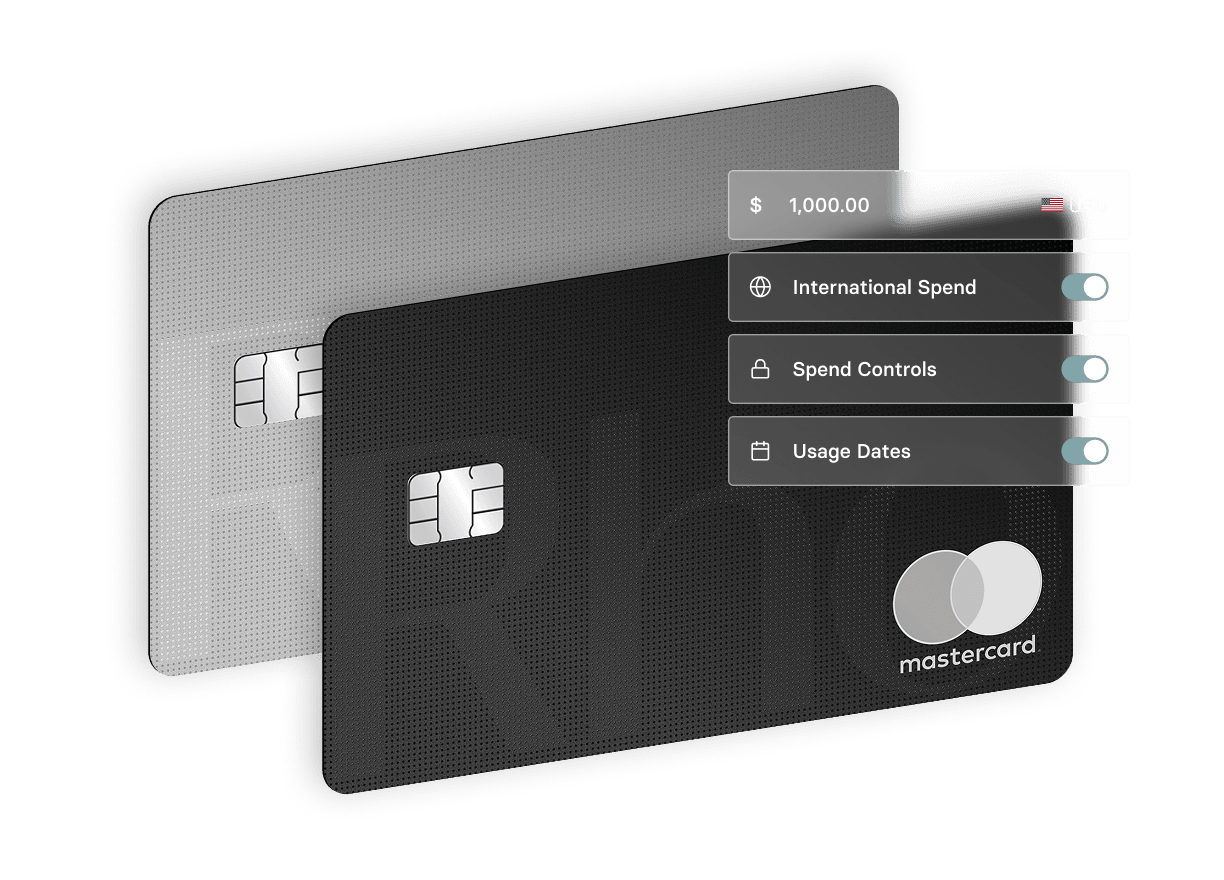 Two credit cards, one black and one gray, with settings for spending limit, international spend, spend controls, and usage dates.