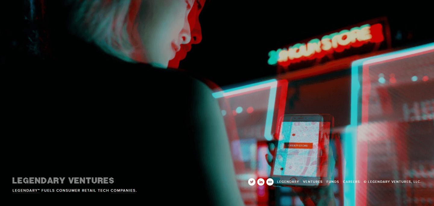 Legendary Ventures homepage showing a person using a smartphone in a neon-lit retail setting.