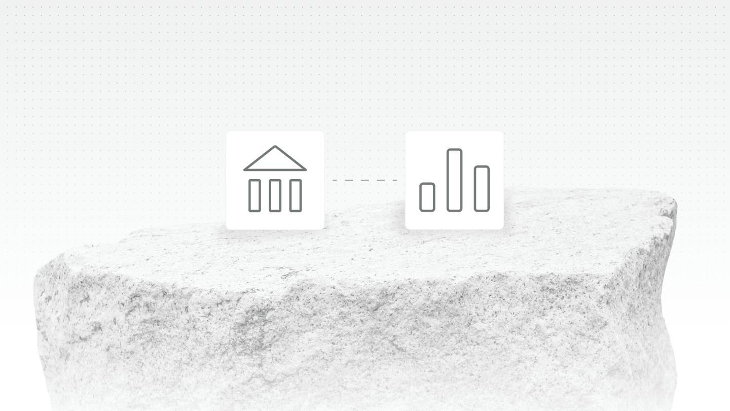 Two minimalist icons on a textured stone surface: a house shape and a bar chart, connected by a dashed line, symbolizing data exchange.