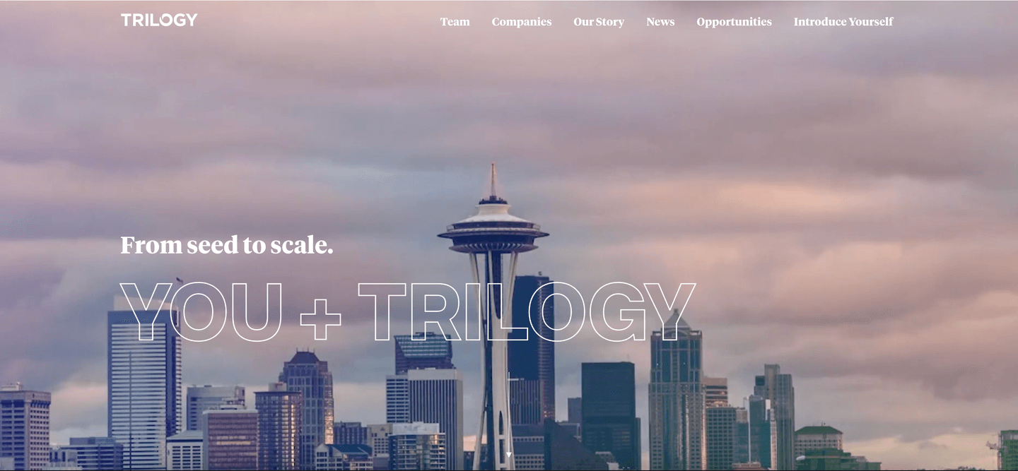 Seattle skyline with the Space Needle under pastel pink clouds, overlaid by "TRILOGY" logo and the headline "From seed to scale."