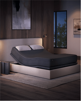 Image of an EightSleep mattress inside of a warmly lit home in the night