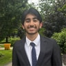 smiling man in a suit
