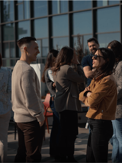 people speaking on a roof