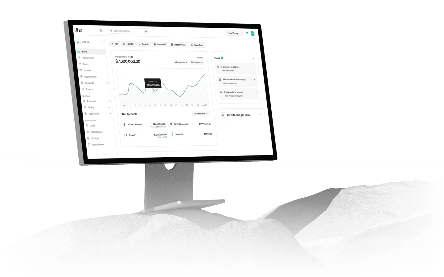 desktop computer on rocks showing rho homepage screen with clean ui
