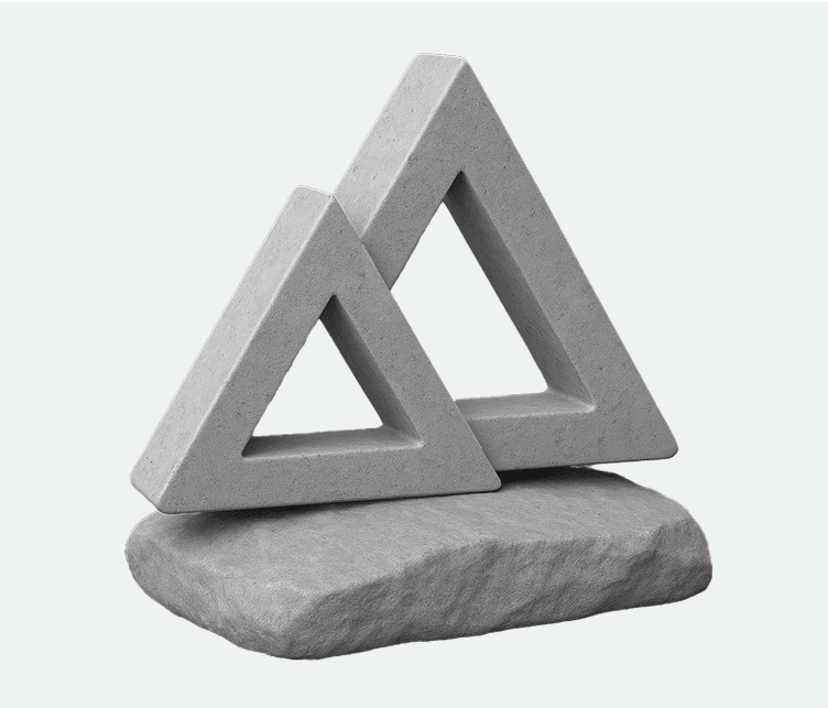 Two interlocking stone triangles resting on a textured stone base, set against a plain background.