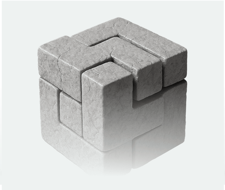 A gray, textured 3D puzzle cube with interlocking pieces, reflected on a smooth surface, against a light background.