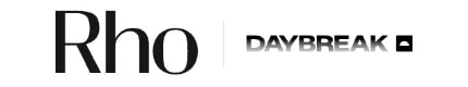 The image shows the text "Rho DAYBREAK" in bold font on a white background, with "DAYBREAK" fading out to the right.